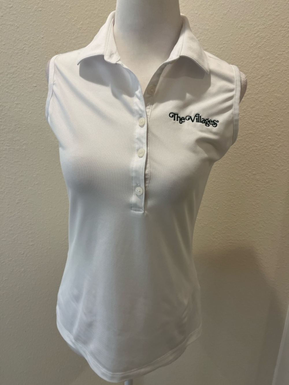 Greg Norman Collection White Sleeveless Polo with 'The Villages' Embroidery